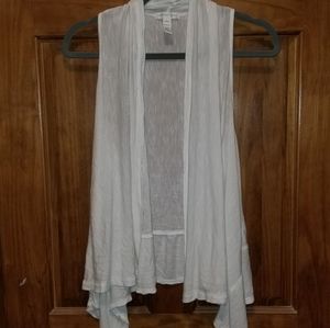 White sleeveless flowy shrug